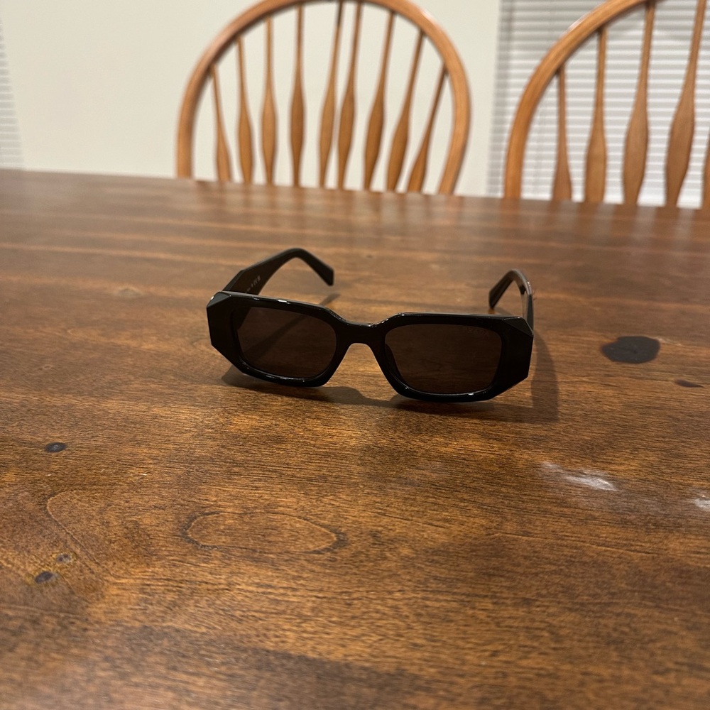 Black Prada sunglasses. Great to wear on a night out or on the beach